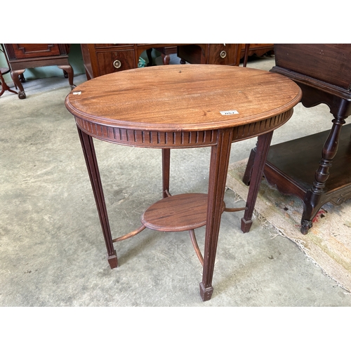 57 - Oval Mah Inlaid Occ Table