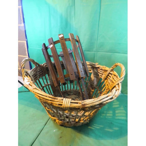 68 - A VINTAGE WICKER AND CANE BASKET AND OUTDOOR PLANTER