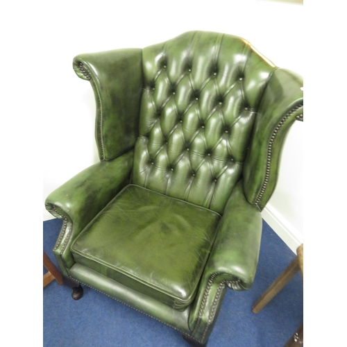 601 - A GREEN LEATHER - WING BACK  - CHESTERFIELD ARM CHAIR