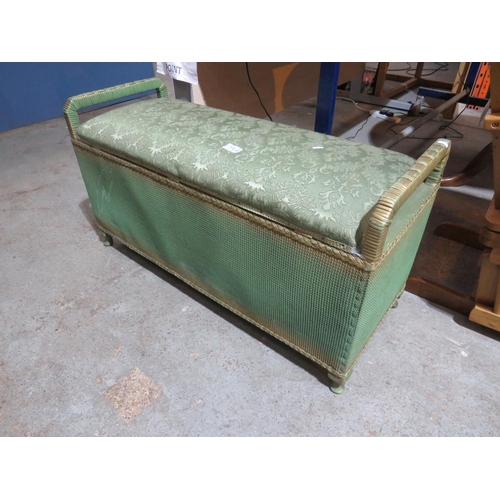 18 - A LLOYD LOOM STYLE OTTOMAN/BLANKET BOX