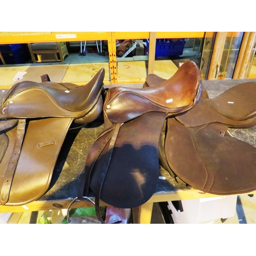 530 - THREE HORSE SADDLES