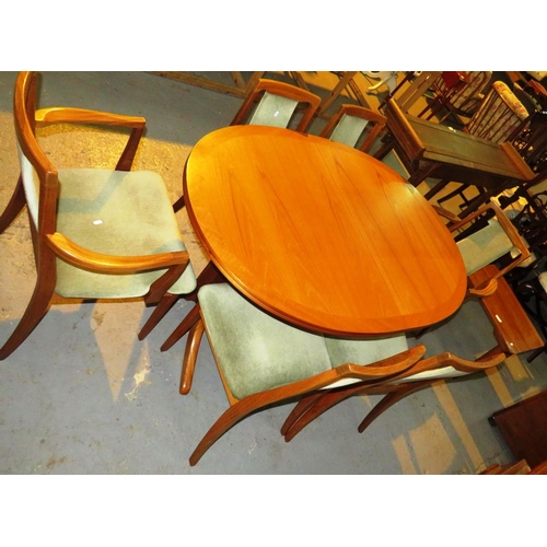 55 - A MID CENTURY PARKER AND KNOLL TABLE AND SIX G--PLAN CHAIRS INCLUDES TWO CARVERS