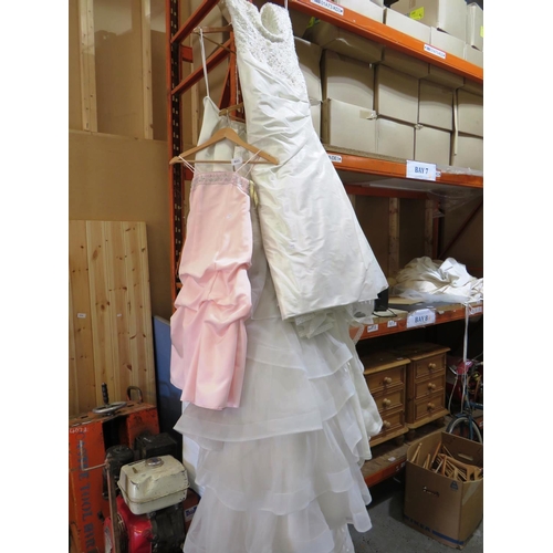 33 - FOUR BRAND NEW WEDDING DRESSES - EX STOCK