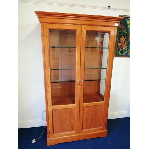 62 - TEAK DISPLAY CABINET WITH BEVELLED GLASS