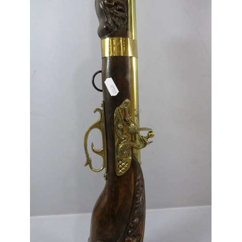 257 - ORNAMENTAL WALL HANGING BRASS AND WOOD SHOT GUN