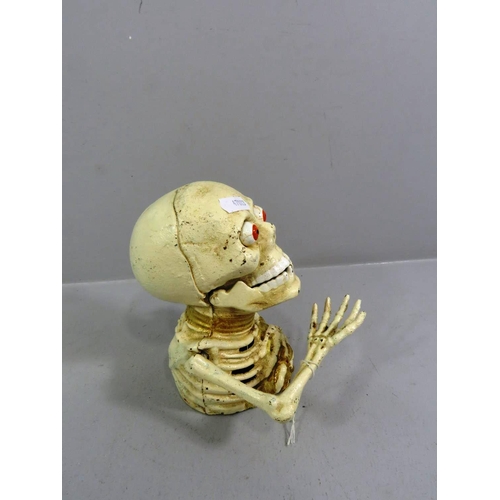 571 - SKELETON CAST IRON MONEY BOX