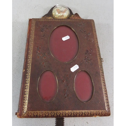 303 - A LEATHER BOUND PHOTOGRAPH ALBUM