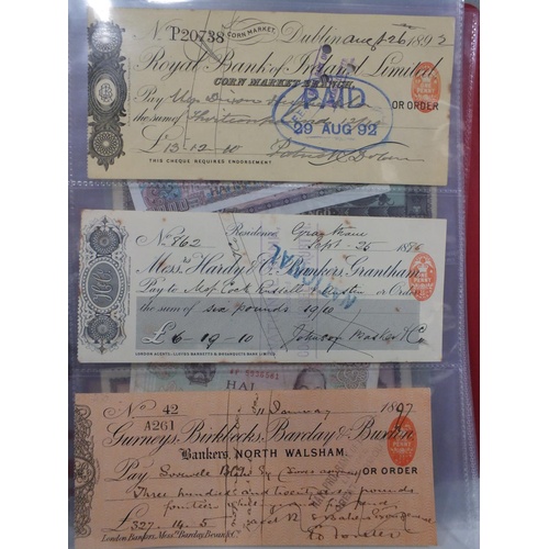 180 - ALBUM OF OLD CHEQUES AND BANKNOTES