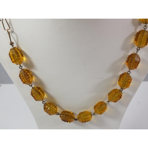 187 - ANTIQUE AMBER CUT GLASS BEAD NECKLACE