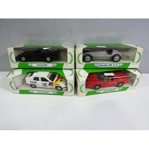 423 - FOUR BOXED CORGI CARS