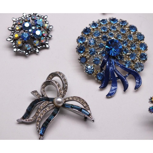 257 - SIX LOVELY BLUE AND WHITE STONE BROOCHES INCLUDES SWEETHEART BROOCH