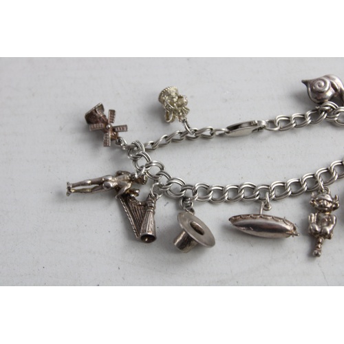 193 - Vintage Stamped .925 STERLING SILVER Charm Bracelet w/ Various Charms (30g)