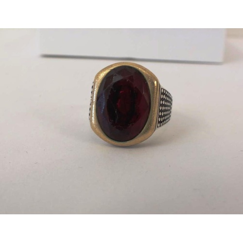 227 - STERLING SILVER RING WITH MOUNTED RED STONE, SIZE Y