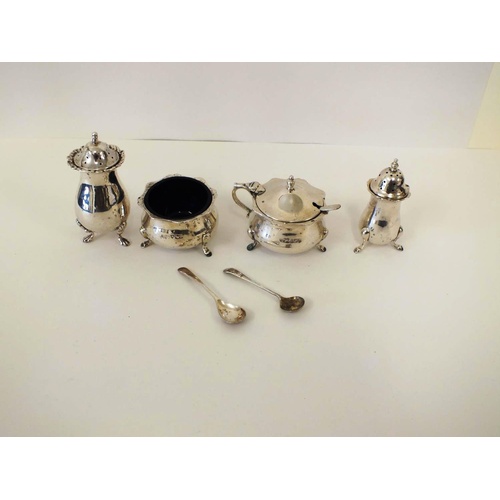 244 - VINTAGE STERLING SILVER CRUET INCLUDES SALT CELLAR, MUSTARD POT, TWO PEPPERETTES AND TWO SALT SPOONS... 