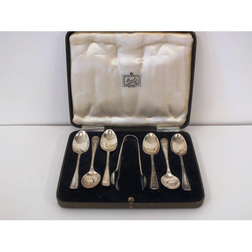 247 - A BOXED SET OF SIX STERLING SILVER SPOONS AND TONGS BY REIDS LTD