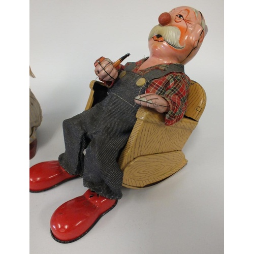 293 - VINTAGE TINPLATE BATTERY OPERATED DRUMMING INDIAN JOE TOY AND OLD MAN IN ROCKING CHAIR SMOKING A PIP... 