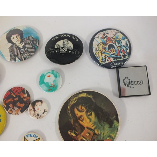 298 - ELEVEN BADGES INCLUDES BEATLES,QUEEN,ALICE COOPER ETC