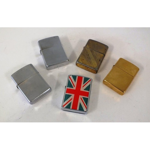 316 - FOUR ZIPPO PETROL LIGHTERS AND A UNION JACK ZIPPO STYLE PETROL LIGHTER