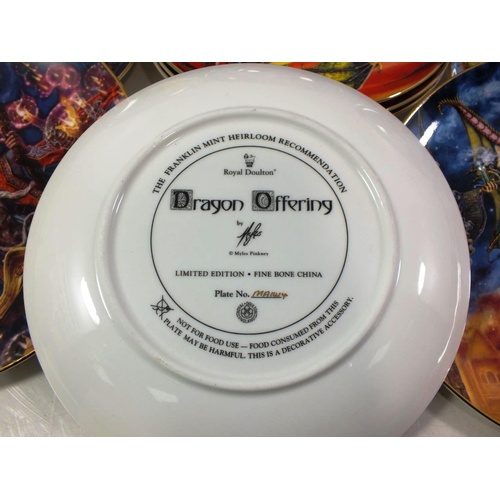 397 - ELEVEN ROYAL DOULTON DRAGON MASTERS PLATES