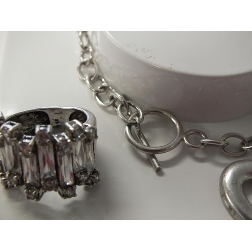 239 - COLLECTION OF MIXED JEWELLERY INCLUDES SILVER BRACELETS AND RINGS