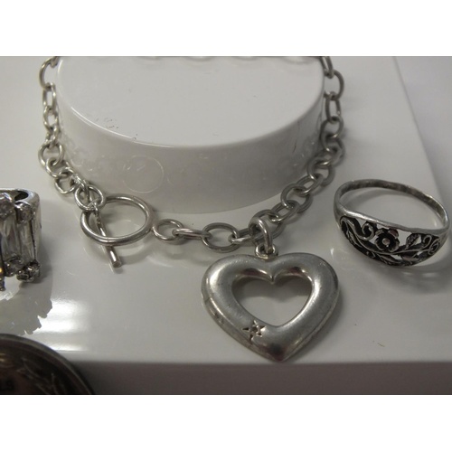 239 - COLLECTION OF MIXED JEWELLERY INCLUDES SILVER BRACELETS AND RINGS