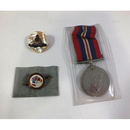 104 - WWII MEDAL AND TWO WWI SWEETHEART BADGES