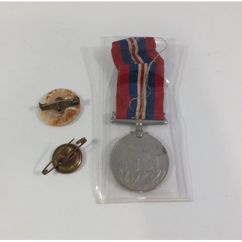 104 - WWII MEDAL AND TWO WWI SWEETHEART BADGES