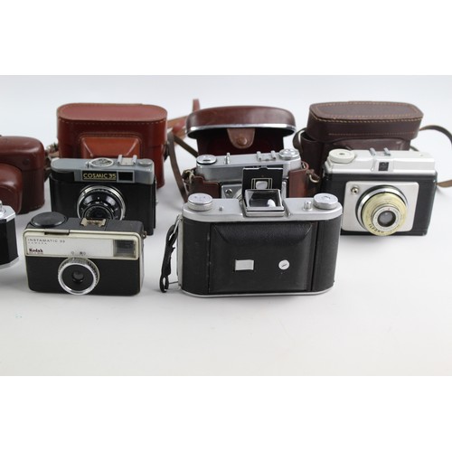 72 - 7 x VINTAGE CAMERAS Inc. Kodak, Halina, Ensign, Ilford & Cosmic 35 w/ Some Cases