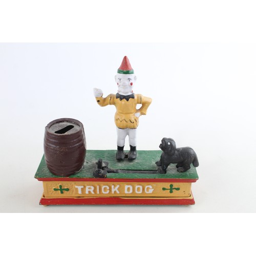 114 - 2 x Vintage Cast Iron Repro MONEY BOXES Inc Trick Dog, Uncle Sam Bank