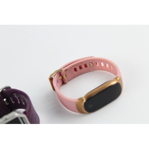 63 - 4 x Assorted FITNESS TRACKER WATCHES Inc Fitbit, Polar Etc