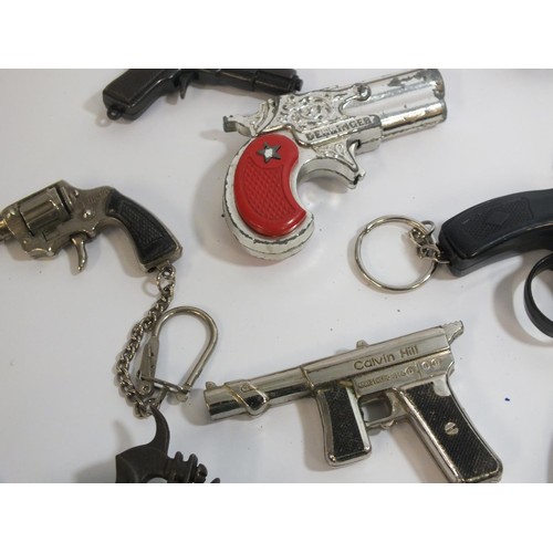 352 - ELEVEN VINTAGE MINIATURE CAP GUNS AND KEYRINGS