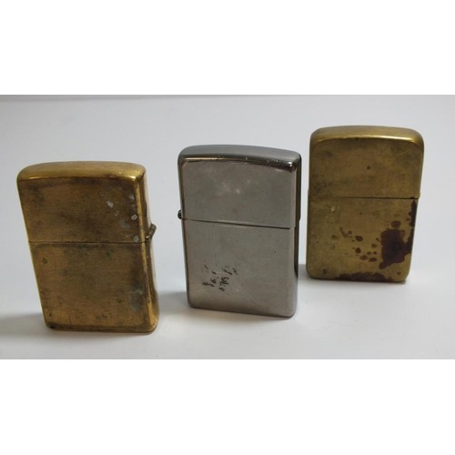 394 - THREE VINTAGE ZIPPO LIGHTERS