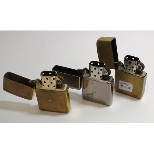 394 - THREE VINTAGE ZIPPO LIGHTERS