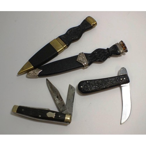 404 - TWO SHEFFIELD QUALITY PEN KNIFES AND TWO SCOTTISH DAGGER AND JEWEL LETTER OPENERS