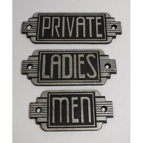 369 - THREE CAST IRON ART DECO STYLE SIGNS