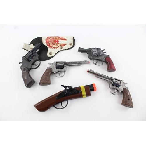 283 - 5 x Assorted Vintage Toy Cap Guns Inc. Crescent, Leather Holster,  Etc