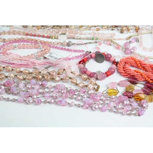 58 - 25 x PINK GLASS JEWELLERY inc. Necklaces, Bracelets, Pendants