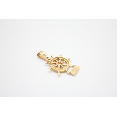 4 - Vintage gold QE2 ships wheel charm 2.2g (18ct)