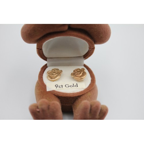 44 - 9ct gold monkey stud earrings in box