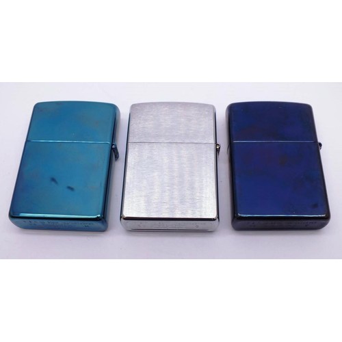 56 - 3 ZIPPOS;
BRUSHED CHROME HARLEY-DAVIDSON 'FLY TO FURY' 
CHROME INDIGO 'HARLEY DAVIDSON MOTORCYCLES' ... 