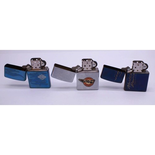 56 - 3 ZIPPOS;
BRUSHED CHROME HARLEY-DAVIDSON 'FLY TO FURY' 
CHROME INDIGO 'HARLEY DAVIDSON MOTORCYCLES' ... 