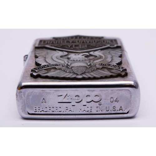 58 - THREE ZIPPOS;
CHROME HARLEY DAVIDSON MORTORCYCLE CXIII
MATTE BLACK EAGLE HARLEY DAVIDSON 
BRUSHED CH... 