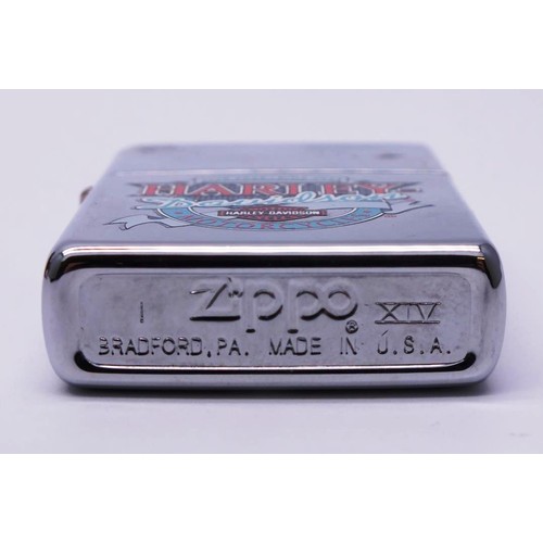 62 - THREE ZIPPOS;
HARLEY DAVIDSON ANTIQUE CHAIN DRIVE-G02
HARLEY DAVIDSON 'MOTORCYCLES LIVE FREE RIDE FR... 