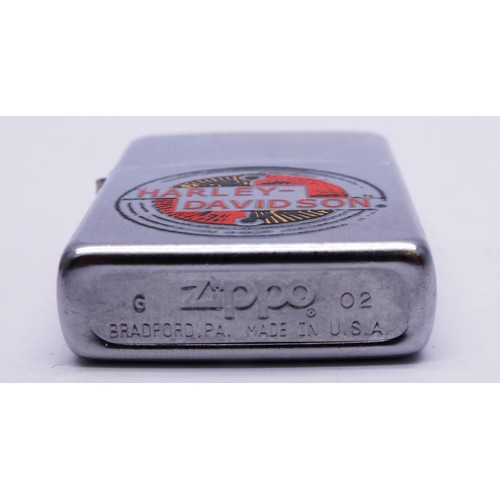 65 - THREE ZIPPOS;
CHROME HARLEY DAVIDSON- G02
HARLEY DAVIDSON RIDE HARD OR STAY HOME -1997- C XV
MATTA B... 