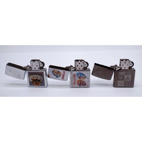 50 - THREE ZIPPOS;
BEATLES MAGICAL MYSTERY TOUR-C XIII
DARK CHROME LED ZEPPELIN- K03
BRUSED CHROME ROLLIN... 