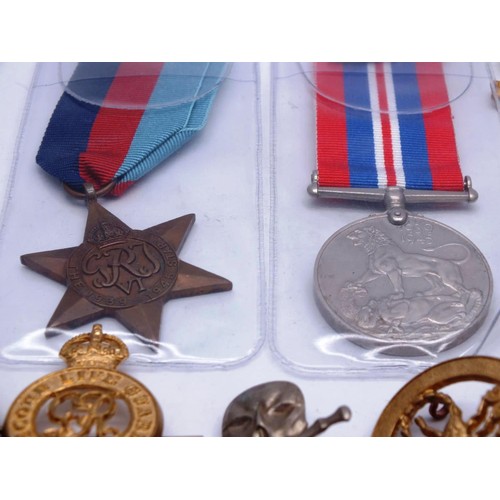 427 - COLLECTION OF MEDALS, BADGES etc