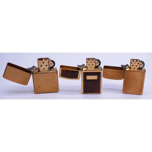 112 - THREE ZIPPOS;
SLIM LINE SOLID BRASS- J03
SLIM LINE RARE GOLD PLATED TORTOISE SHELL- 2000 F XVI
GOLD ... 