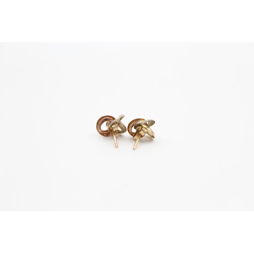 66 - 9ct white, rose and yellow gold knot earrings (boxed) (0.6g)