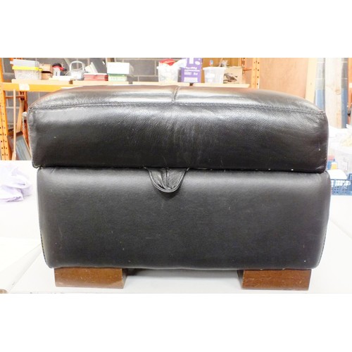 557 - BLACK LEATHER FOOTSTOOL/STORAGE BOX