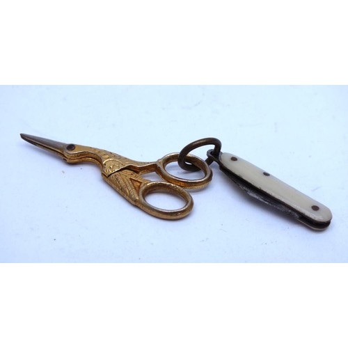 573 - VINTAGE MINIATURE BRASS CRANE SEWING SCISSORS AND PENKNIFE